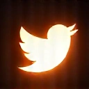 Abstract, glowing Twitter logo-like icon